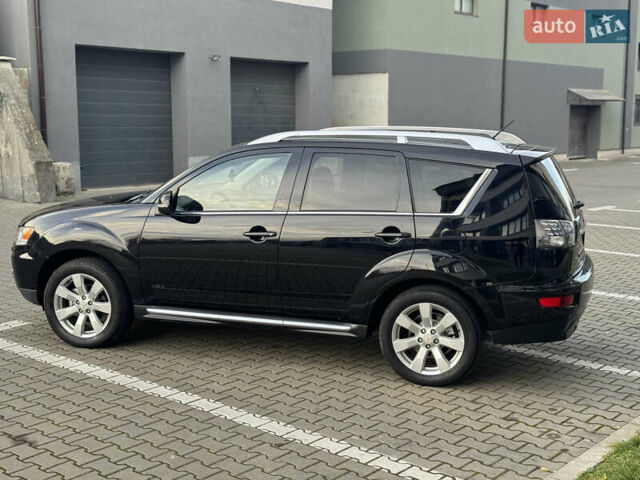 Черный Мицубиси Аутлендер, объемом двигателя 2.2 л и пробегом 225 тыс. км за 10950 $, фото 22 на Automoto.ua