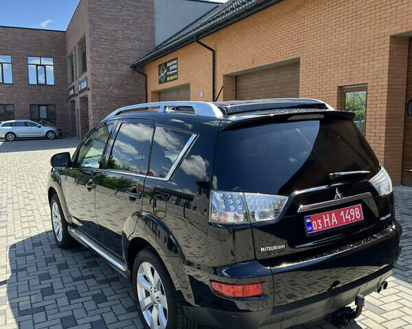 Чорний Міцубісі Аутлендер, об'ємом двигуна 2.2 л та пробігом 214 тис. км за 10600 $, фото 9 на Automoto.ua