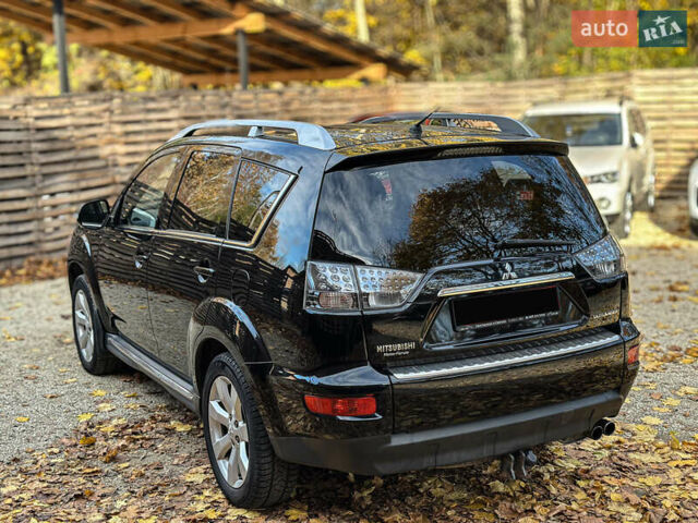 Черный Мицубиси Аутлендер, объемом двигателя 2.2 л и пробегом 226 тыс. км за 11500 $, фото 17 на Automoto.ua