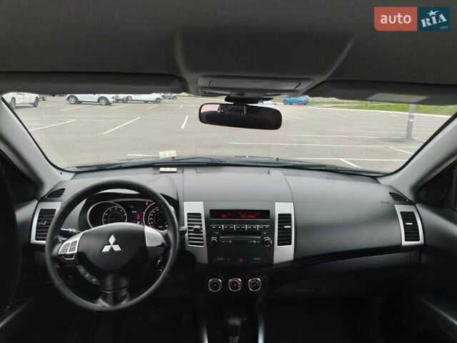Чорний Міцубісі Аутлендер, об'ємом двигуна 2 л та пробігом 226 тис. км за 10750 $, фото 9 на Automoto.ua