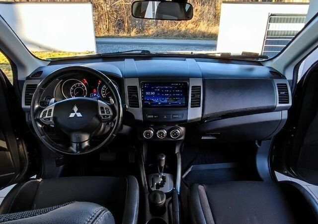Черный Мицубиси Аутлендер, объемом двигателя 2 л и пробегом 264 тыс. км за 2900 $, фото 6 на Automoto.ua