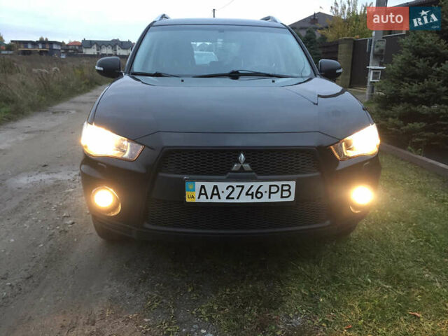 Черный Мицубиси Аутлендер, объемом двигателя 2.36 л и пробегом 315 тыс. км за 9700 $, фото 23 на Automoto.ua