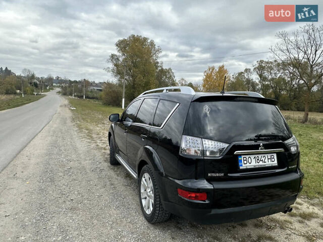 Черный Мицубиси Аутлендер, объемом двигателя 1.97 л и пробегом 224 тыс. км за 9000 $, фото 9 на Automoto.ua