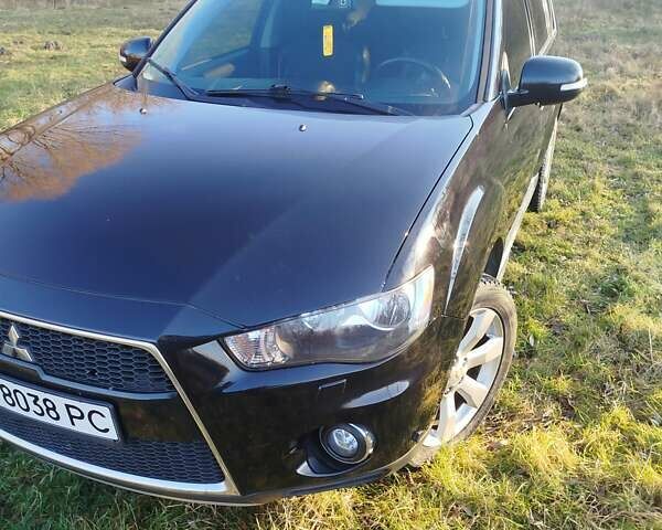 Черный Мицубиси Аутлендер, объемом двигателя 2 л и пробегом 261 тыс. км за 9700 $, фото 7 на Automoto.ua