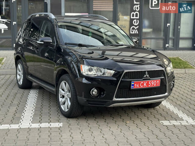 Черный Мицубиси Аутлендер, объемом двигателя 2.2 л и пробегом 225 тыс. км за 10950 $, фото 5 на Automoto.ua