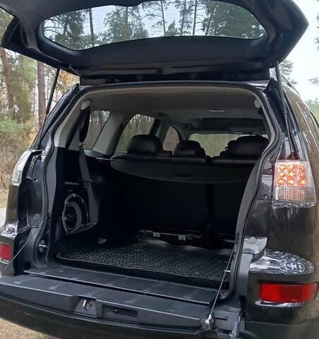 Черный Мицубиси Аутлендер, объемом двигателя 2.2 л и пробегом 267 тыс. км за 9999 $, фото 16 на Automoto.ua