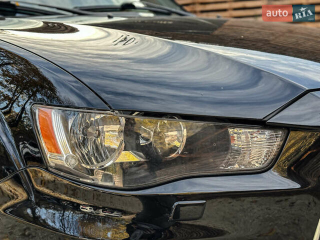 Черный Мицубиси Аутлендер, объемом двигателя 2.2 л и пробегом 226 тыс. км за 11500 $, фото 43 на Automoto.ua