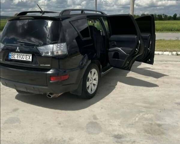 Чорний Міцубісі Аутлендер, об'ємом двигуна 2.4 л та пробігом 187 тис. км за 10200 $, фото 6 на Automoto.ua