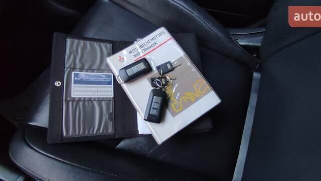 Черный Мицубиси Аутлендер, объемом двигателя 2 л и пробегом 210 тыс. км за 10600 $, фото 28 на Automoto.ua