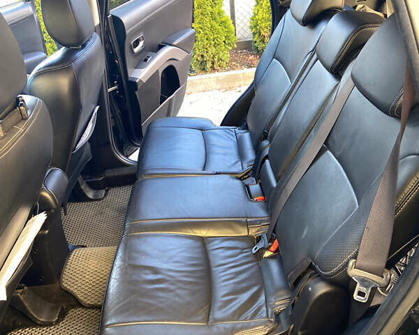 Черный Мицубиси Аутлендер, объемом двигателя 1.97 л и пробегом 292 тыс. км за 10900 $, фото 30 на Automoto.ua