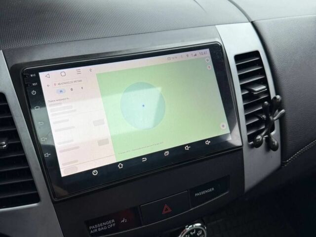 Чорний Міцубісі Аутлендер, об'ємом двигуна 2 л та пробігом 210 тис. км за 10700 $, фото 4 на Automoto.ua