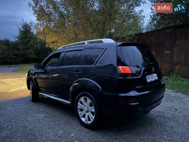 Чорний Міцубісі Аутлендер, об'ємом двигуна 2 л та пробігом 258 тис. км за 8699 $, фото 18 на Automoto.ua