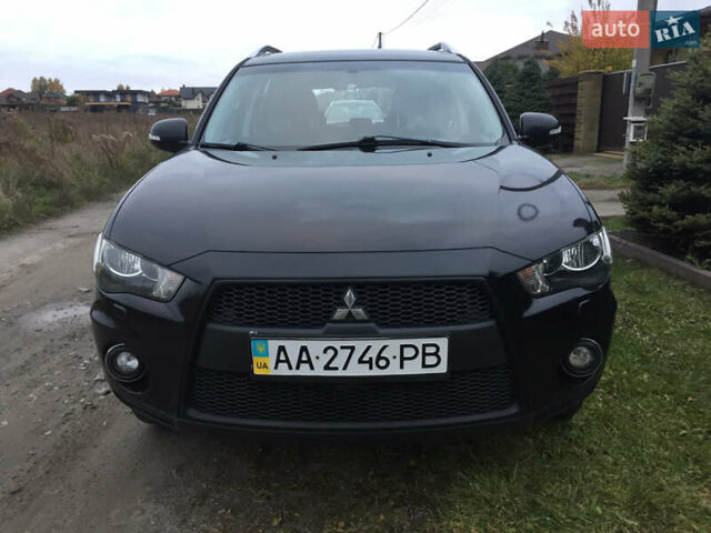 Черный Мицубиси Аутлендер, объемом двигателя 2.36 л и пробегом 315 тыс. км за 9700 $, фото 2 на Automoto.ua