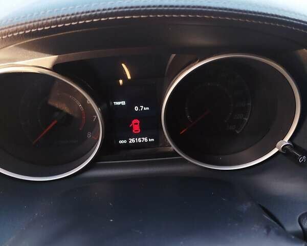 Черный Мицубиси Аутлендер, объемом двигателя 2 л и пробегом 261 тыс. км за 9700 $, фото 22 на Automoto.ua