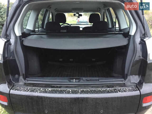 Черный Мицубиси Аутлендер, объемом двигателя 2.36 л и пробегом 315 тыс. км за 9700 $, фото 17 на Automoto.ua