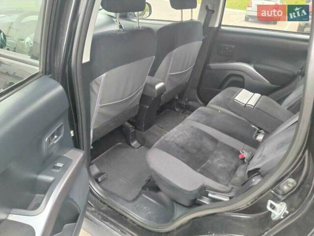 Чорний Міцубісі Аутлендер, об'ємом двигуна 2 л та пробігом 226 тис. км за 10750 $, фото 14 на Automoto.ua