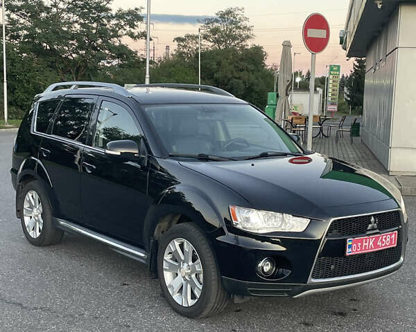 Черный Мицубиси Аутлендер, объемом двигателя 0 л и пробегом 257 тыс. км за 10399 $, фото 2 на Automoto.ua