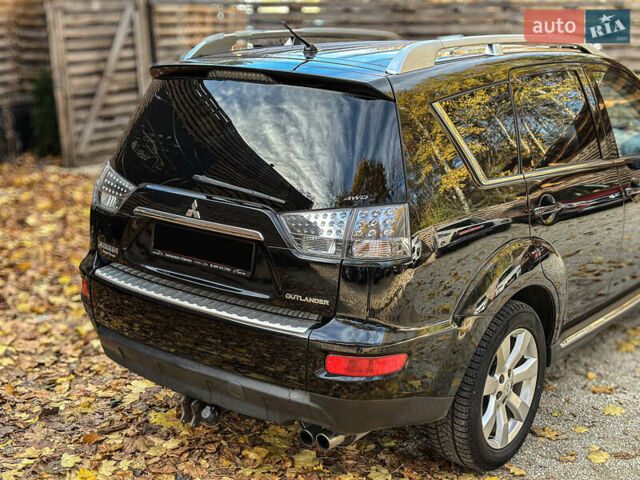 Черный Мицубиси Аутлендер, объемом двигателя 2.2 л и пробегом 226 тыс. км за 11500 $, фото 41 на Automoto.ua
