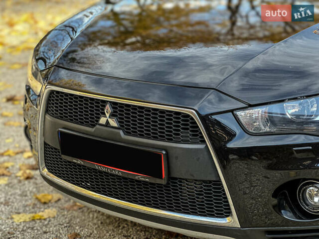 Черный Мицубиси Аутлендер, объемом двигателя 2.2 л и пробегом 226 тыс. км за 11500 $, фото 45 на Automoto.ua