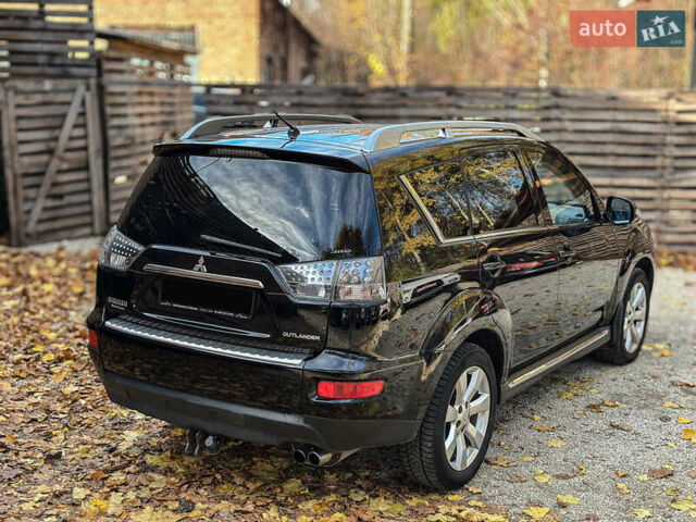 Черный Мицубиси Аутлендер, объемом двигателя 2.2 л и пробегом 226 тыс. км за 11500 $, фото 23 на Automoto.ua