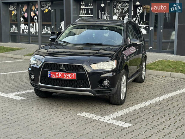 Черный Мицубиси Аутлендер, объемом двигателя 2.2 л и пробегом 225 тыс. км за 10950 $, фото 3 на Automoto.ua