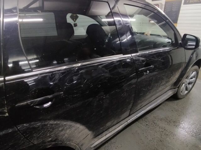 Черный Мицубиси Аутлендер, объемом двигателя 0 л и пробегом 215 тыс. км за 9500 $, фото 11 на Automoto.ua