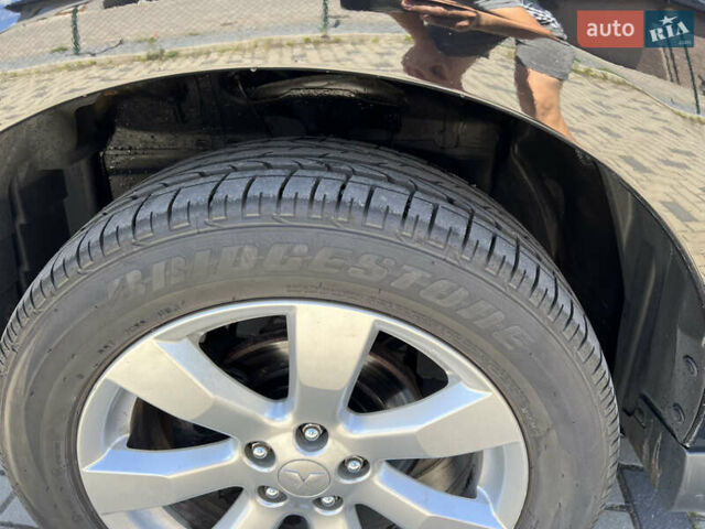 Чорний Міцубісі Аутлендер, об'ємом двигуна 2.2 л та пробігом 214 тис. км за 10600 $, фото 10 на Automoto.ua