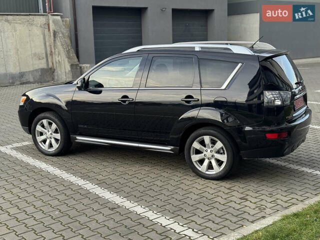 Черный Мицубиси Аутлендер, объемом двигателя 2.2 л и пробегом 225 тыс. км за 10950 $, фото 21 на Automoto.ua