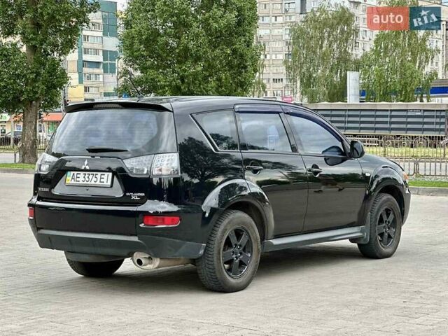 Мицубиси Аутлендер 2010 в Днепре (Днепропетровске) на Automoto.ua Черный Мицубиси Аутлендер, объемом двигателя 2 л и пробегом 220 тыс. км за 8900 $, фото 21 на Automoto.ua