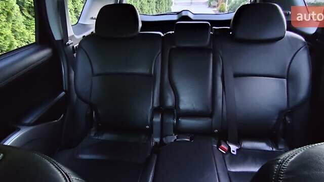 Черный Мицубиси Аутлендер, объемом двигателя 2 л и пробегом 210 тыс. км за 10600 $, фото 22 на Automoto.ua