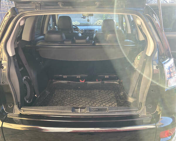 Черный Мицубиси Аутлендер, объемом двигателя 1.97 л и пробегом 292 тыс. км за 10900 $, фото 25 на Automoto.ua