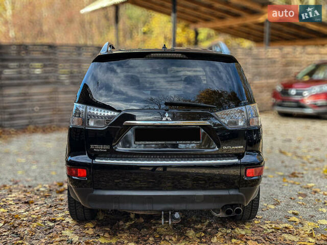 Черный Мицубиси Аутлендер, объемом двигателя 2.2 л и пробегом 226 тыс. км за 11500 $, фото 19 на Automoto.ua