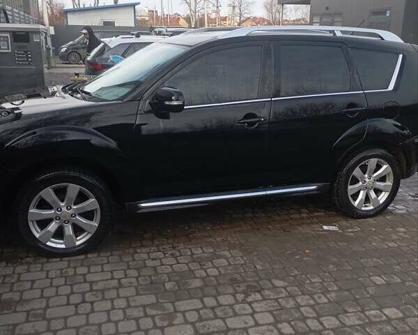 Черный Мицубиси Аутлендер, объемом двигателя 2.2 л и пробегом 264 тыс. км за 10700 $, фото 7 на Automoto.ua