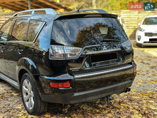 Черный Мицубиси Аутлендер, объемом двигателя 2.2 л и пробегом 226 тыс. км за 11500 $, фото 34 на Automoto.ua