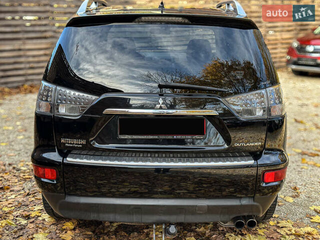 Черный Мицубиси Аутлендер, объемом двигателя 2.2 л и пробегом 226 тыс. км за 11500 $, фото 37 на Automoto.ua