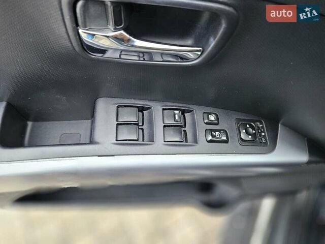 Чорний Міцубісі Аутлендер, об'ємом двигуна 2.4 л та пробігом 70 тис. км за 13000 $, фото 10 на Automoto.ua