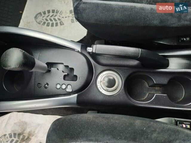 Чорний Міцубісі Аутлендер, об'ємом двигуна 2 л та пробігом 226 тис. км за 10750 $, фото 15 на Automoto.ua