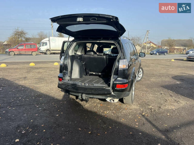 Черный Мицубиси Аутлендер, объемом двигателя 2.36 л и пробегом 244 тыс. км за 9850 $, фото 16 на Automoto.ua