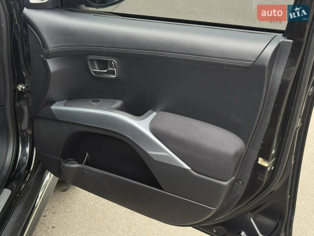 Чорний Міцубісі Аутлендер, об'ємом двигуна 1.97 л та пробігом 276 тис. км за 9200 $, фото 23 на Automoto.ua