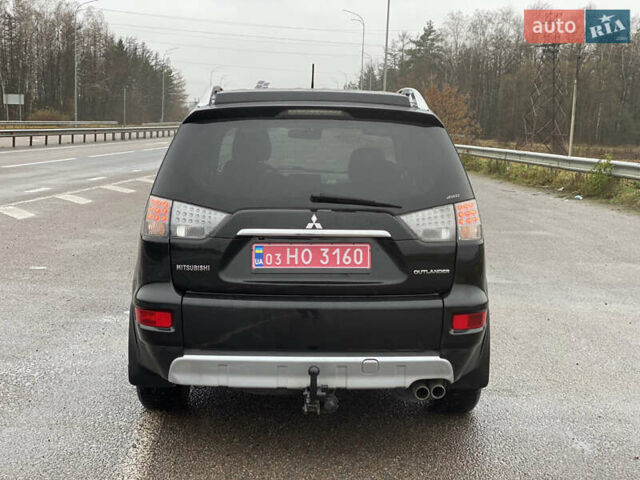 Черный Мицубиси Аутлендер, объемом двигателя 2.2 л и пробегом 227 тыс. км за 10700 $, фото 17 на Automoto.ua