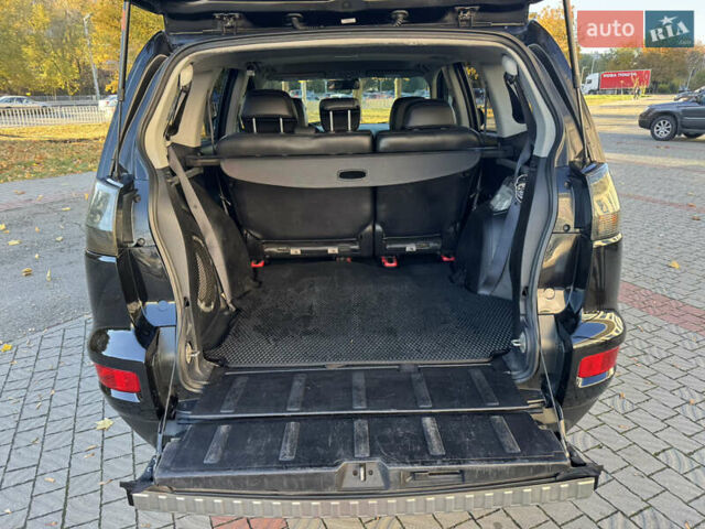 Черный Мицубиси Аутлендер, объемом двигателя 3 л и пробегом 162 тыс. км за 10800 $, фото 16 на Automoto.ua