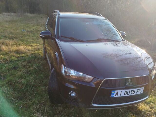 Черный Мицубиси Аутлендер, объемом двигателя 2 л и пробегом 261 тыс. км за 9700 $, фото 2 на Automoto.ua