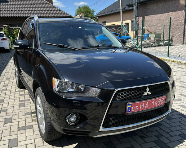 Чорний Міцубісі Аутлендер, об'ємом двигуна 2.2 л та пробігом 214 тис. км за 10600 $, фото 25 на Automoto.ua