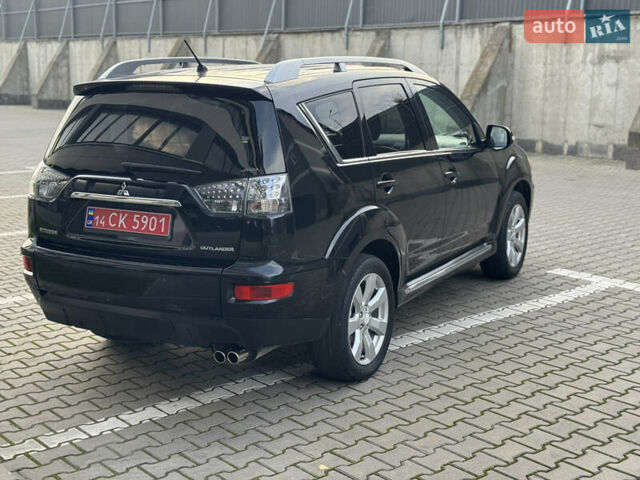 Черный Мицубиси Аутлендер, объемом двигателя 2.2 л и пробегом 225 тыс. км за 10950 $, фото 18 на Automoto.ua