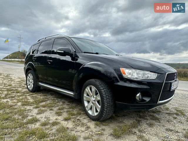 Черный Мицубиси Аутлендер, объемом двигателя 1.97 л и пробегом 224 тыс. км за 9000 $, фото 4 на Automoto.ua