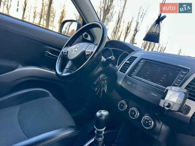 Чорний Міцубісі Аутлендер, об'ємом двигуна 2.3 л та пробігом 212 тис. км за 11200 $, фото 27 на Automoto.ua