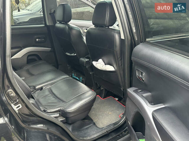 Чорний Міцубісі Аутлендер, об'ємом двигуна 2.36 л та пробігом 197 тис. км за 11300 $, фото 12 на Automoto.ua