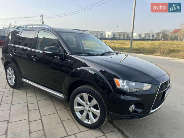 Чорний Міцубісі Аутлендер, об'ємом двигуна 2.36 л та пробігом 244 тис. км за 9850 $, фото 14 на Automoto.ua