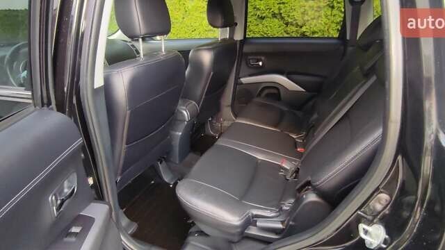 Черный Мицубиси Аутлендер, объемом двигателя 2 л и пробегом 210 тыс. км за 10600 $, фото 12 на Automoto.ua