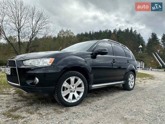 Черный Мицубиси Аутлендер, объемом двигателя 1.97 л и пробегом 224 тыс. км за 9000 $, фото 2 на Automoto.ua